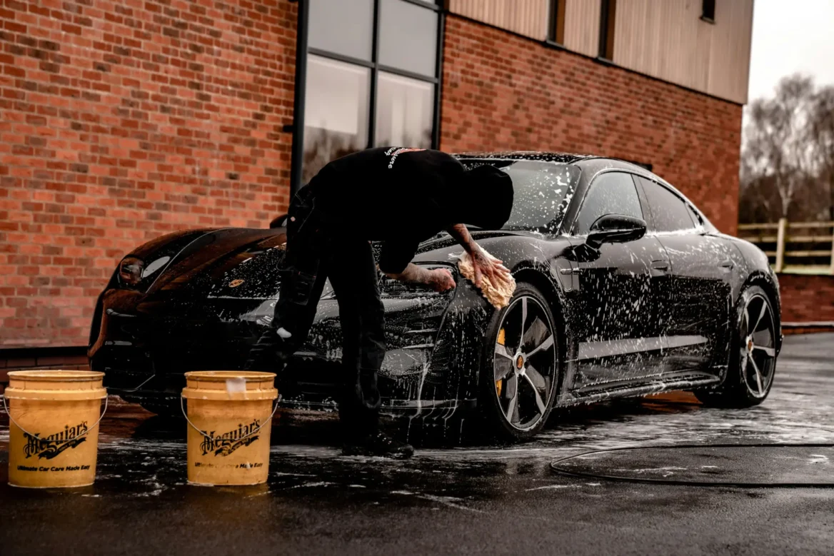 Wash and Wax on a blacked out porsche taycan